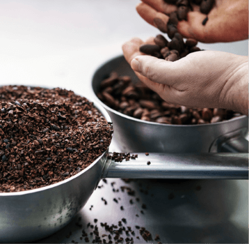 After roasting, the beans are cooled and moved onto the cracking (concasseur) to separate the husks from the fruit .Then we can create the Cocoa Mass by grinding them.